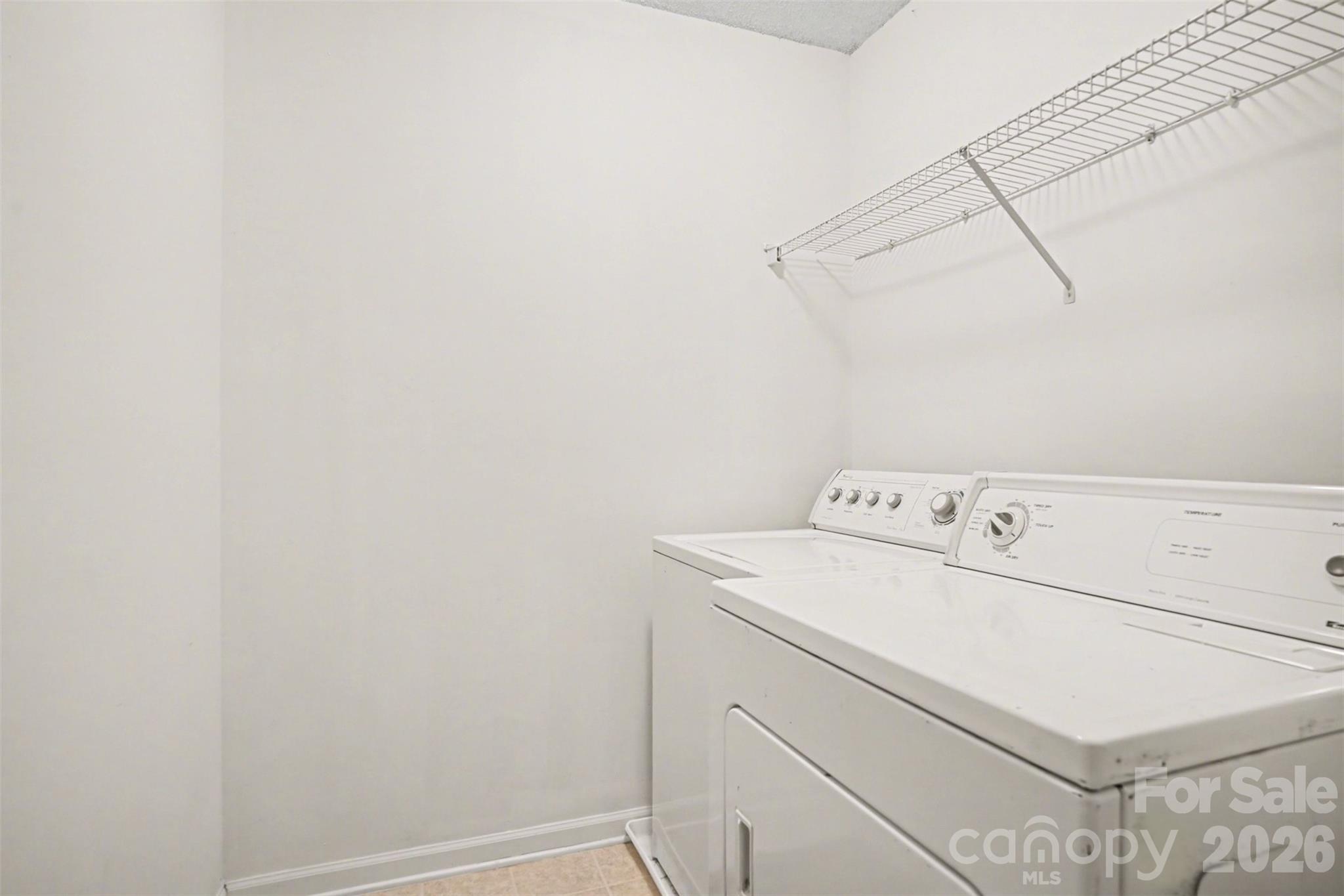 3315 Summerfield Ridge Lane Matthews, NC 28105 - Photo 24 of 27 a utility room with dryer and washer