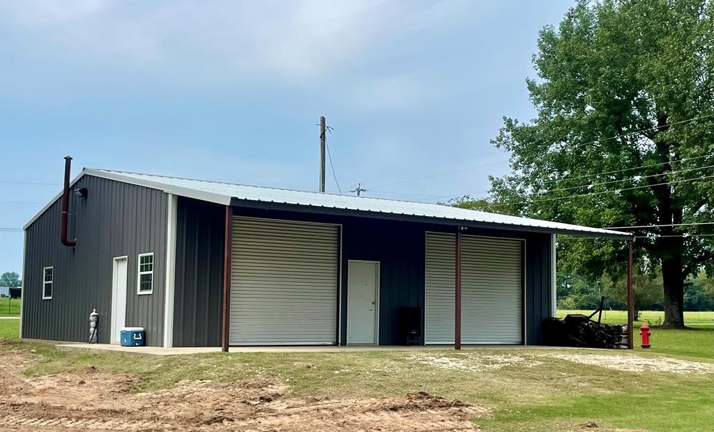 807 El Camino Road Grapeland, TX 75844 - Photo 27 of 34 a house with a outdoor space