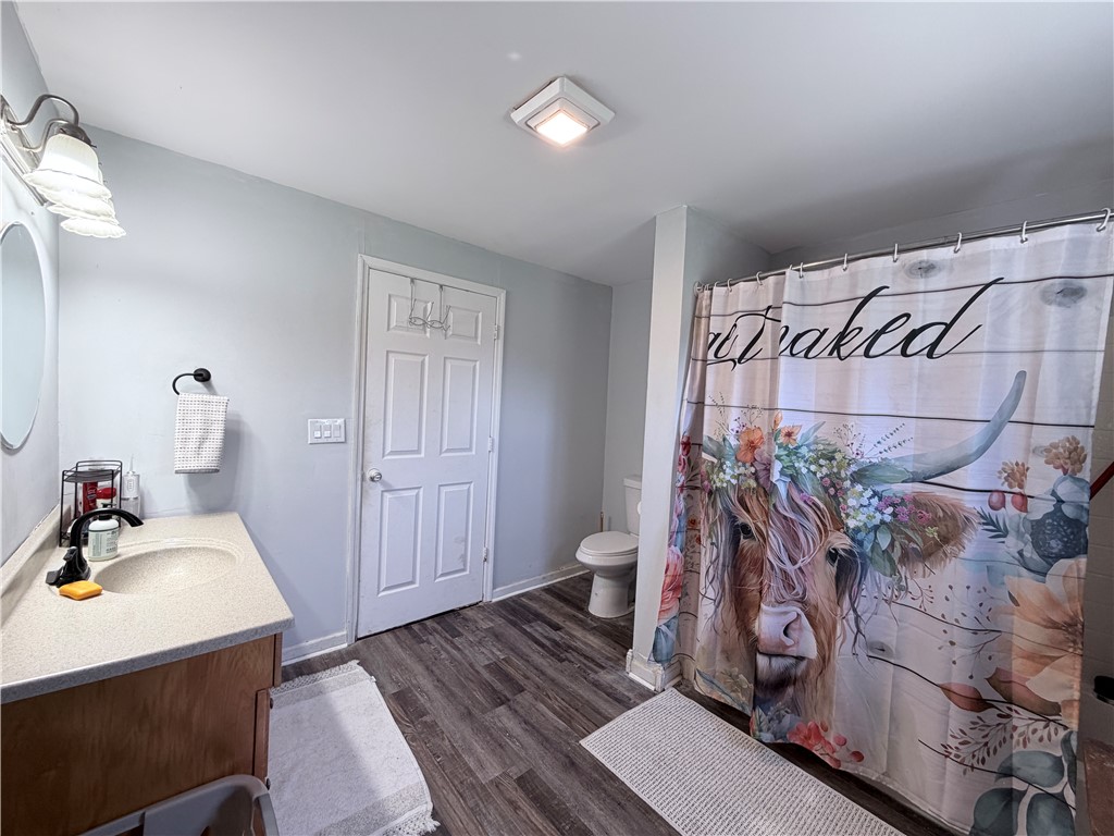 6800 Farmington Road Miamisburg, OH 45342 - Photo 18 of 32 This bathroom features a sleek vanity and modern fixtures.