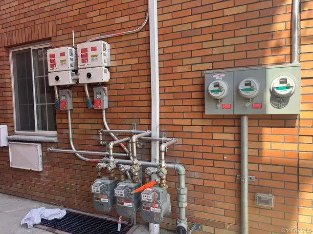 a view of door with brick wall
