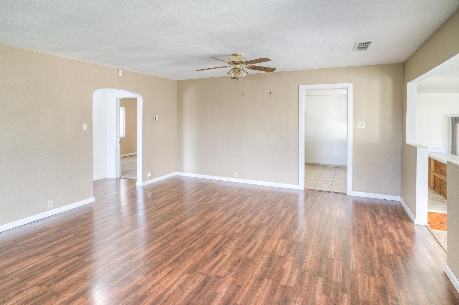 874 South Meridian Road Meridian, CA 95957 - Photo 11 of 54 wooden floor in an empty room with a window