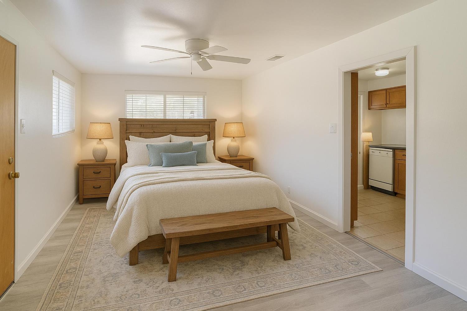 874 South Meridian Road Meridian, CA 95957 - Photo 16 of 54 a bedroom with a bed and a chandelier