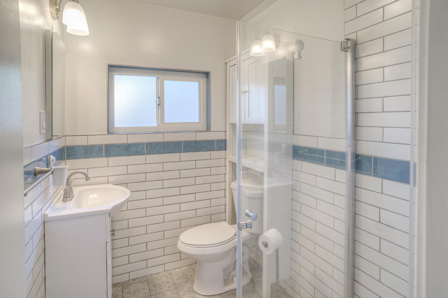 874 South Meridian Road Meridian, CA 95957 - Photo 18 of 54 a bathroom with a toilet sink vanity and shower