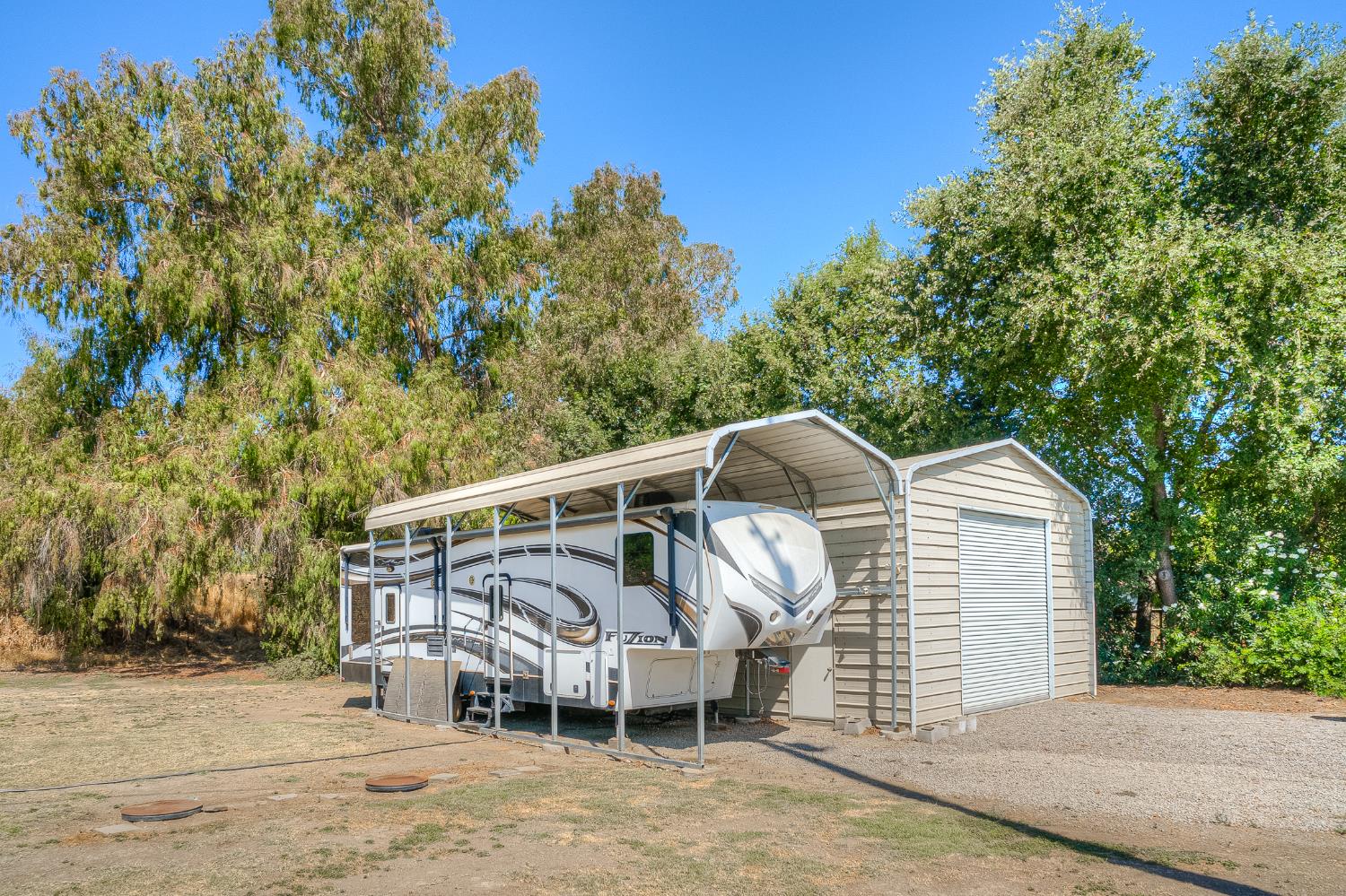 874 South Meridian Road Meridian, CA 95957 - Photo 38 of 54 a view of a wooden deck with a yard