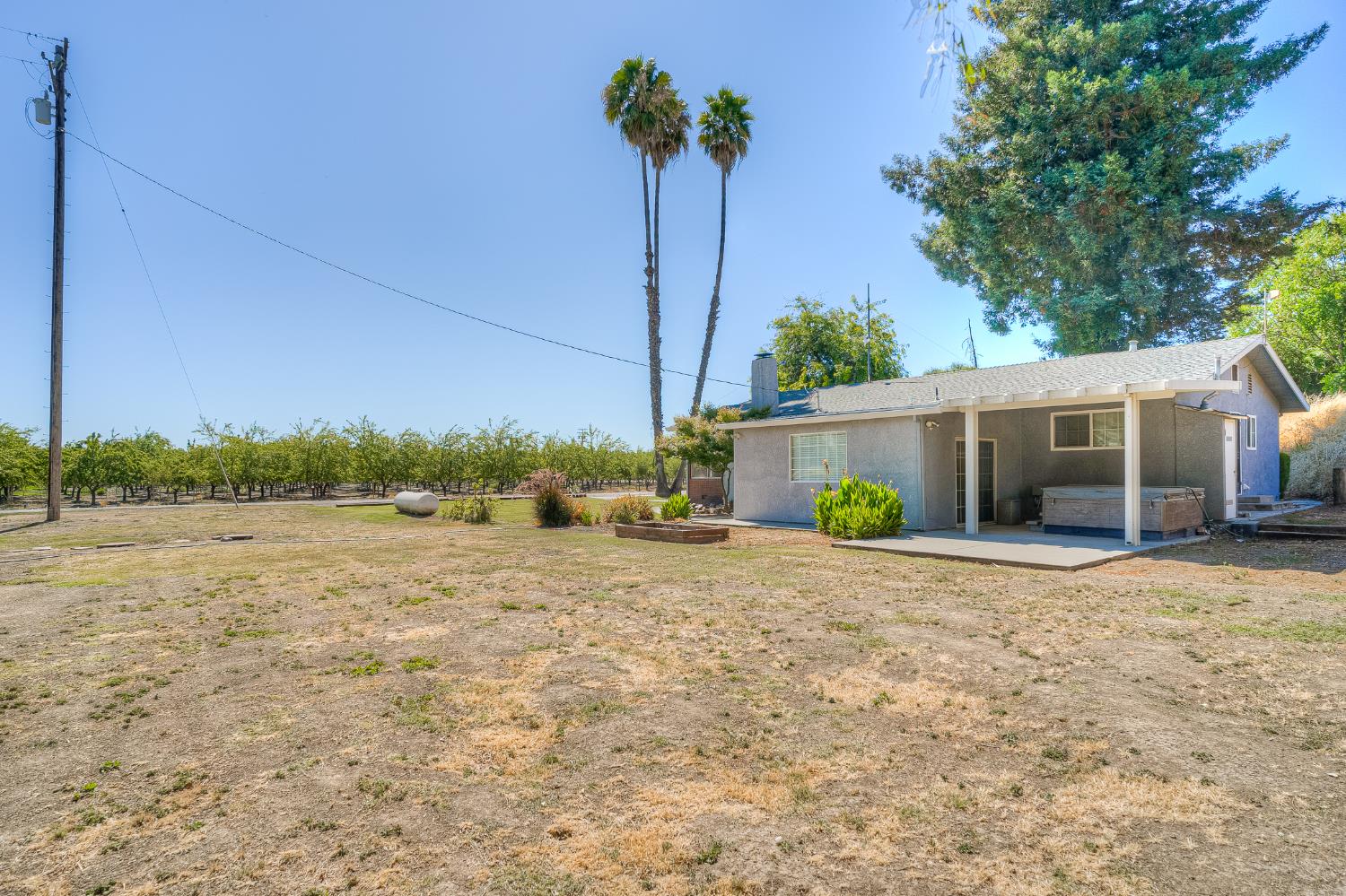 874 South Meridian Road Meridian, CA 95957 - Photo 44 of 54 a view of a house with a yard and potted plants