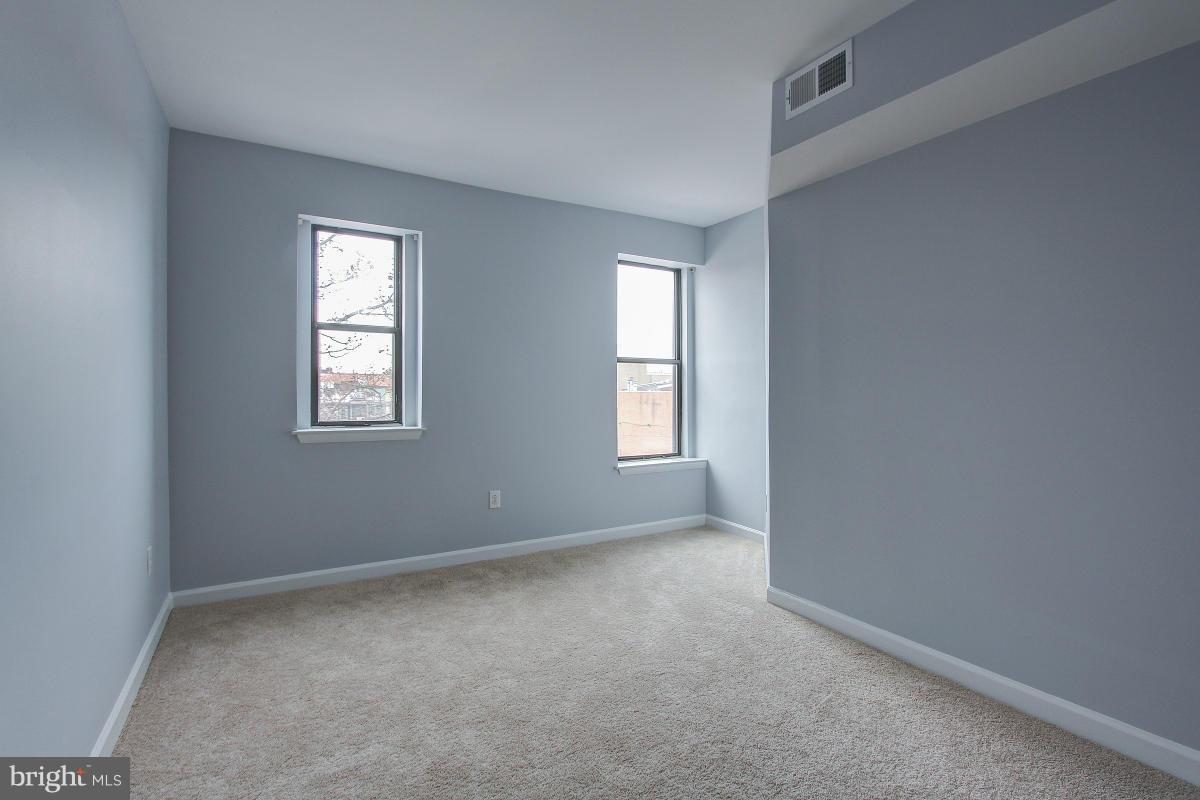 1763 Columbia Road Northwest, Unit 305 Washington, DC 20009 - Photo 15 of 19 Bedroom is bright with natural light