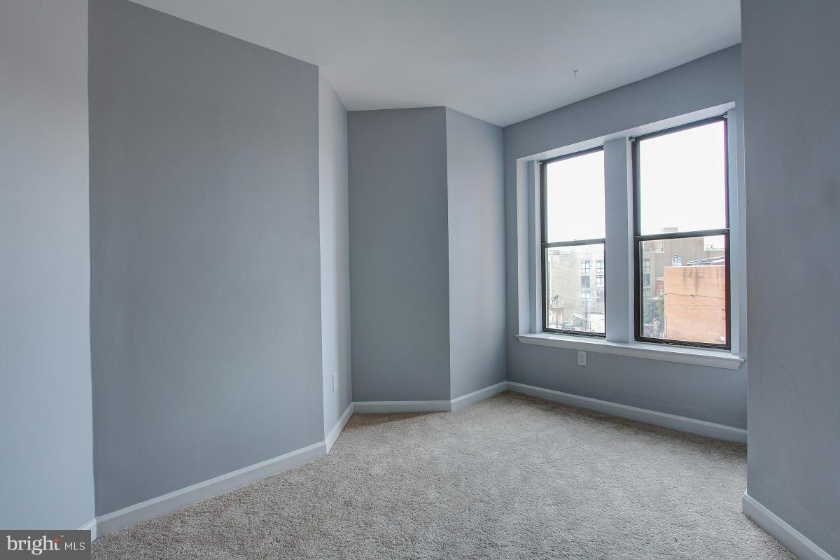 1763 Columbia Road Northwest, Unit 305 Washington, DC 20009 - Photo 5 of 19 A reading nook perhaps, at end of living room