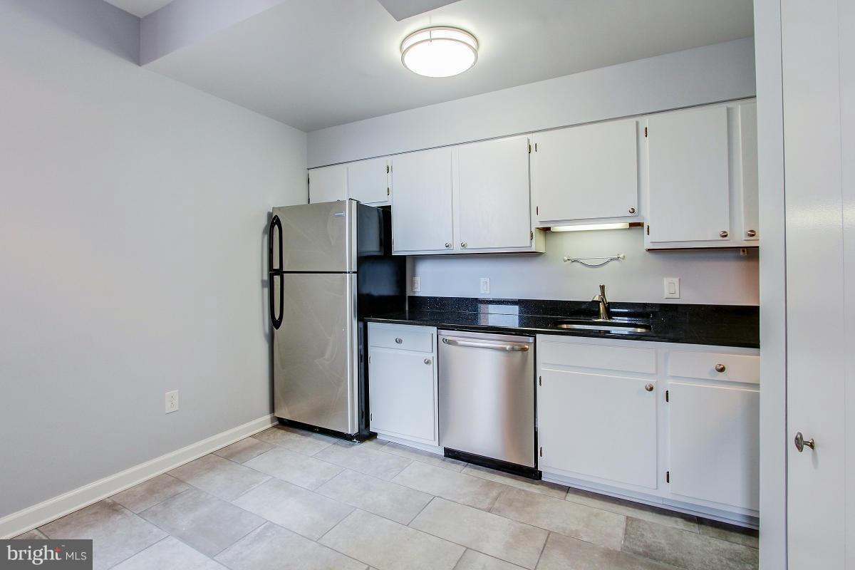 1763 Columbia Road Northwest, Unit 305 Washington, DC 20009 - Photo 9 of 19 See the new tile floor
