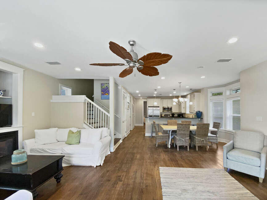 141 Lifeguard Loop East Inlet Beach, FL 32461 - Photo 15 of 40 a living room with furniture kitchen view and a wooden floor