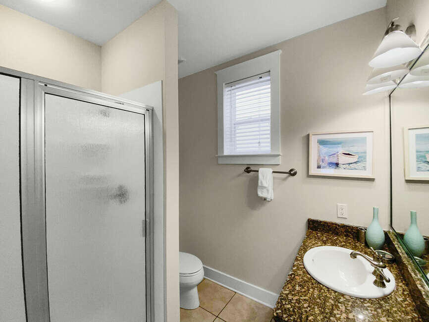 141 Lifeguard Loop East Inlet Beach, FL 32461 - Photo 18 of 40 a bathroom with a sink toilet and shower