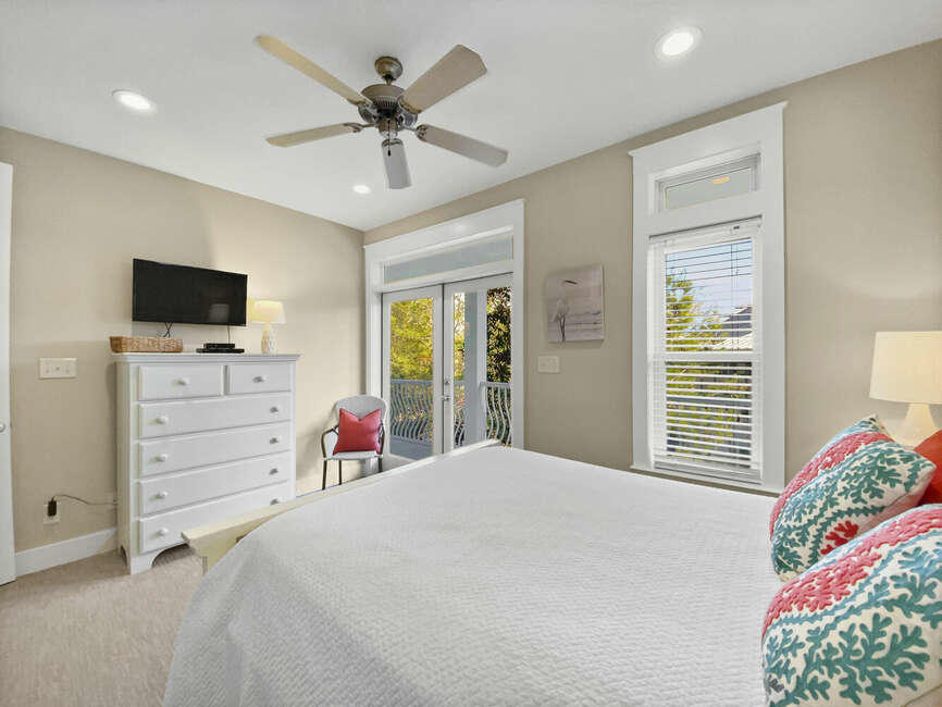 141 Lifeguard Loop East Inlet Beach, FL 32461 - Photo 25 of 40 a bedroom with a bed and a flat screen tv