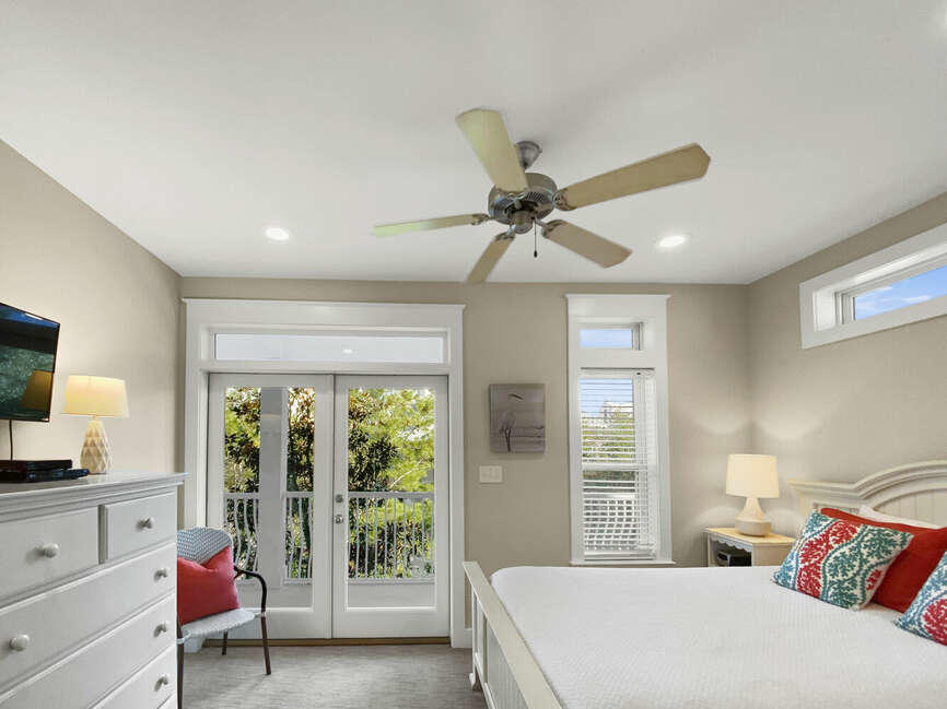 141 Lifeguard Loop East Inlet Beach, FL 32461 - Photo 26 of 40 a bedroom with a bed and a window