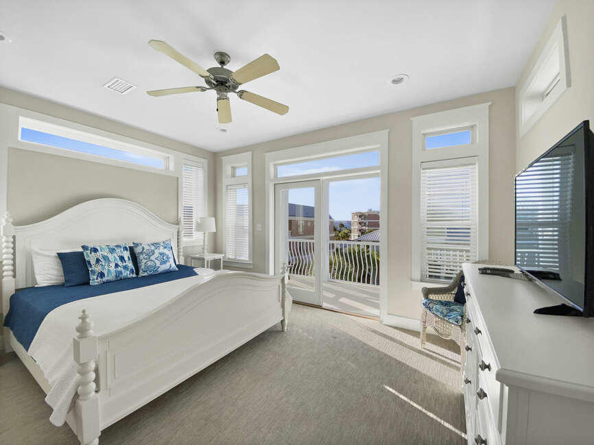 141 Lifeguard Loop East Inlet Beach, FL 32461 - Photo 33 of 40 a bedroom with a bed window and a flat screen tv