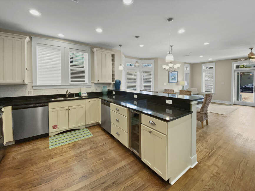 141 Lifeguard Loop East Inlet Beach, FL 32461 - Photo 35 of 40 a white kitchen with a sink and cabinets