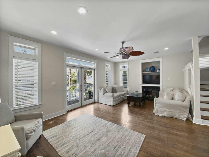 141 Lifeguard Loop East Inlet Beach, FL 32461 - Photo 6 of 40 a living room with furniture and wooden floor