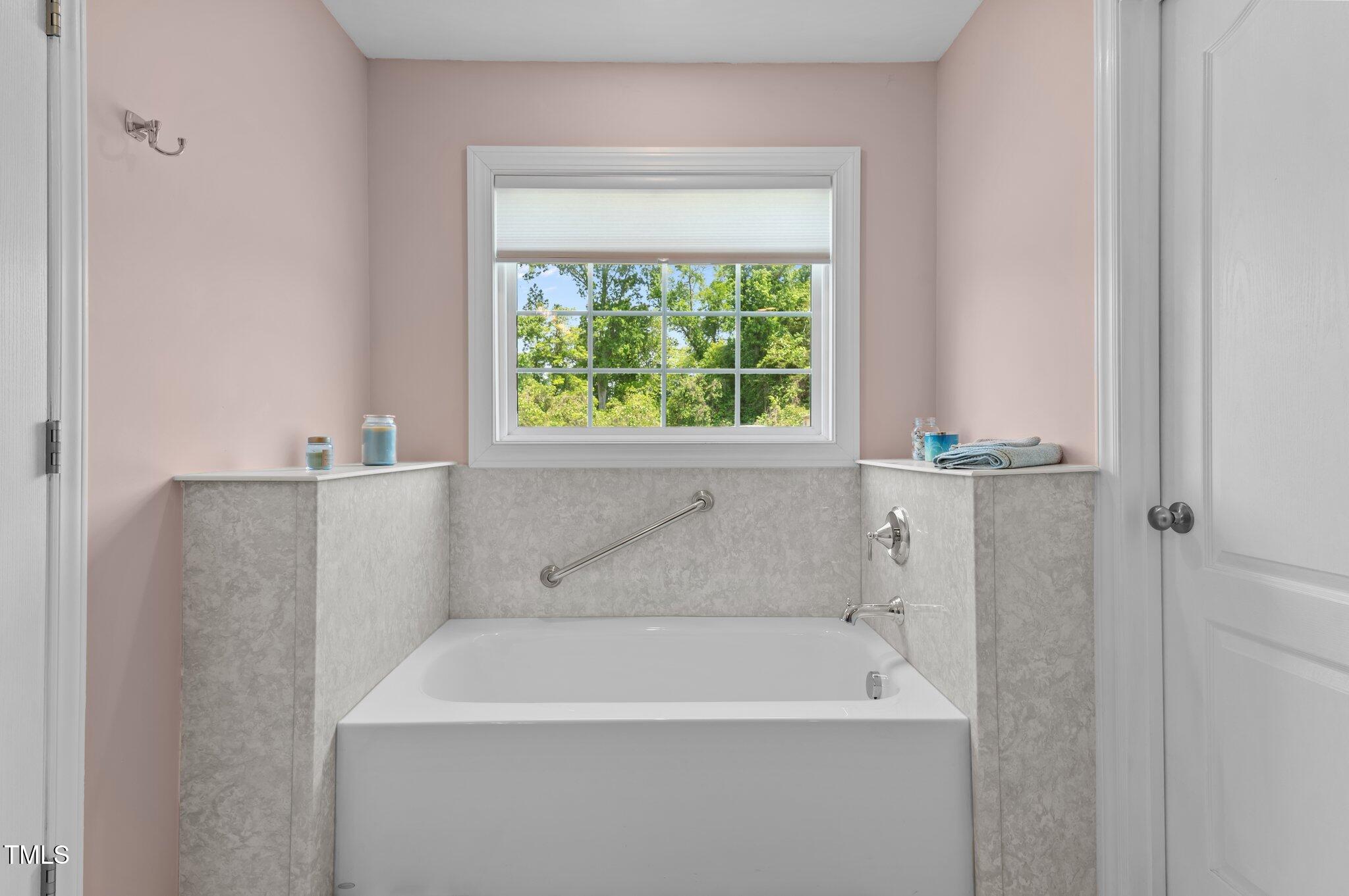 675 Anderson Creek Road Henderson, NC 27537 - Photo 51 of 62 a bathroom with a bathtub