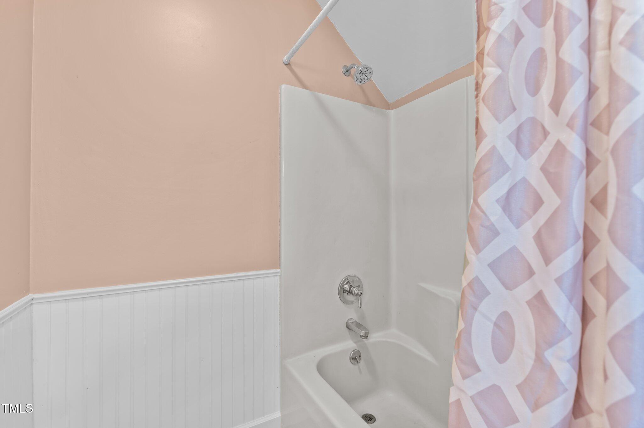 675 Anderson Creek Road Henderson, NC 27537 - Photo 54 of 62 a bathroom with a sink and a bathtub