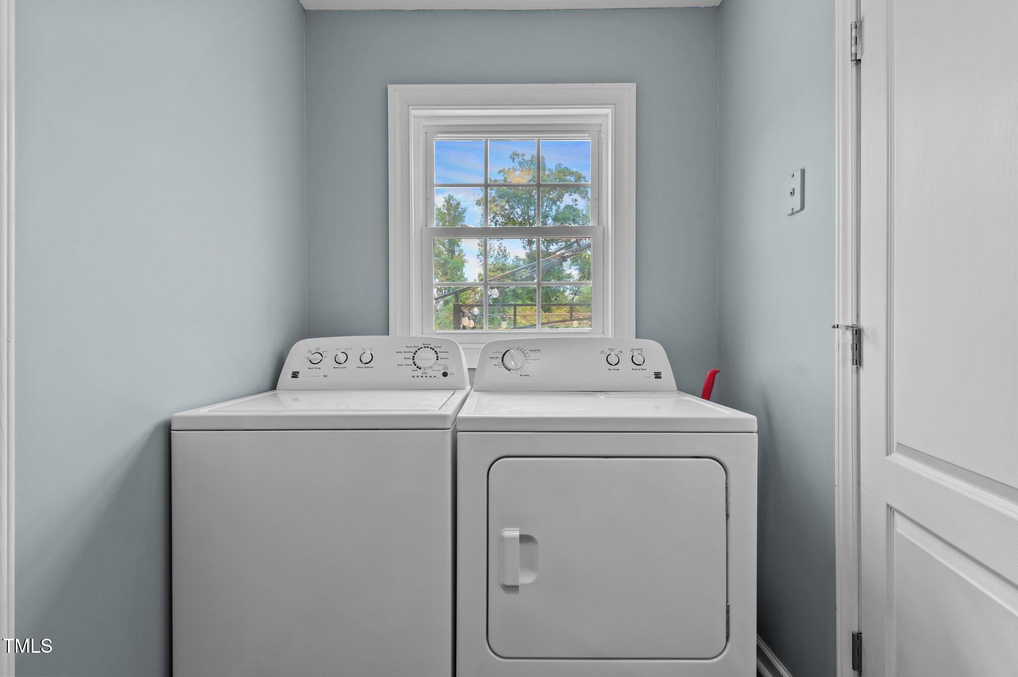 675 Anderson Creek Road Henderson, NC 27537 - Photo 60 of 62 a utility room with dryer and washer