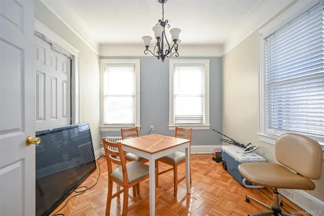 a outdoor dining room with furniture and window