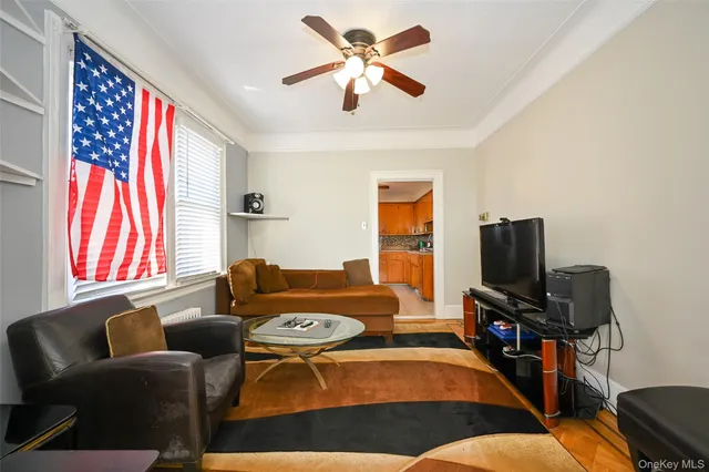 a living room with furniture and a window