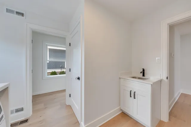 a view of entryway with kitchen