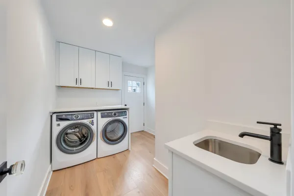 a spacious bathroom with a toilet and a shower