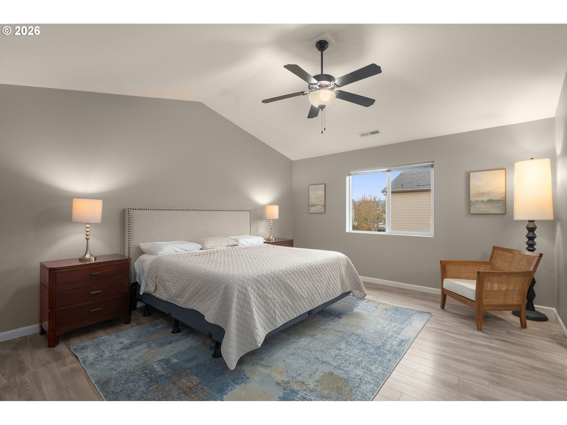 52183 Southeast Tussing Way Scappoose, OR 97056 - Photo 15 of 32 a bedroom with a bed and a window