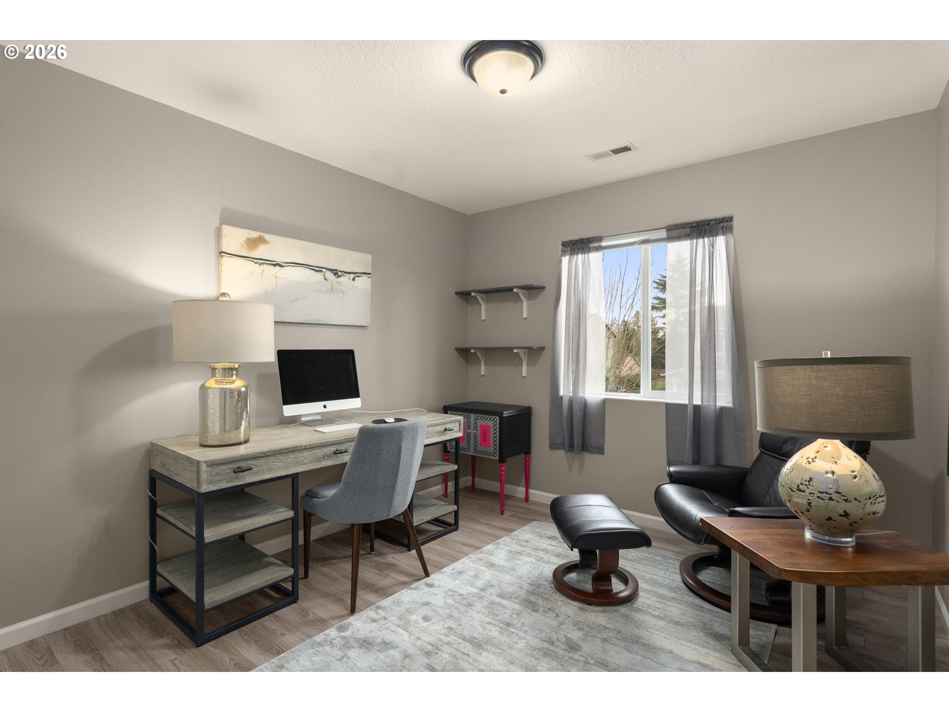 52183 Southeast Tussing Way Scappoose, OR 97056 - Photo 19 of 32 a living room with furniture and a chandelier