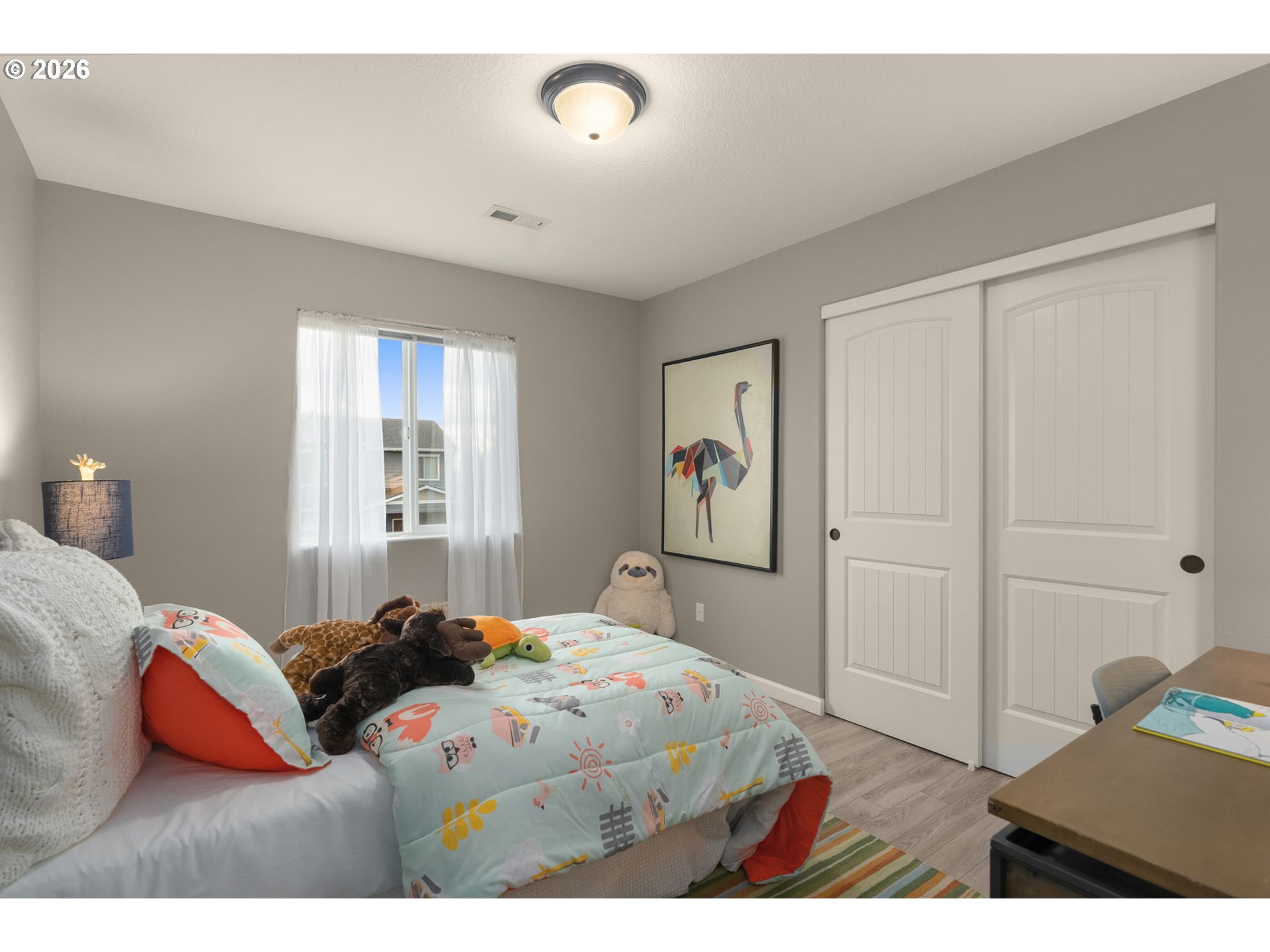 52183 Southeast Tussing Way Scappoose, OR 97056 - Photo 20 of 32 a bedroom with a bed and a window