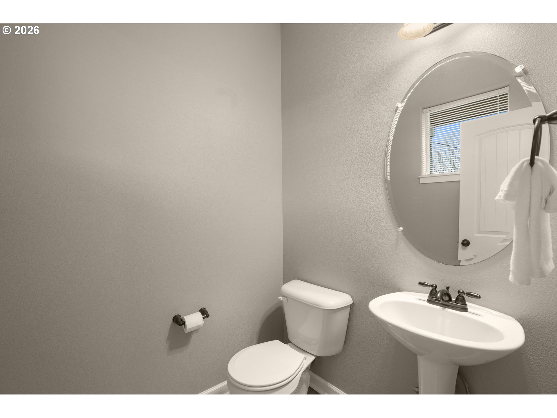 52183 Southeast Tussing Way Scappoose, OR 97056 - Photo 22 of 32 a bathroom with a toilet sink and mirror