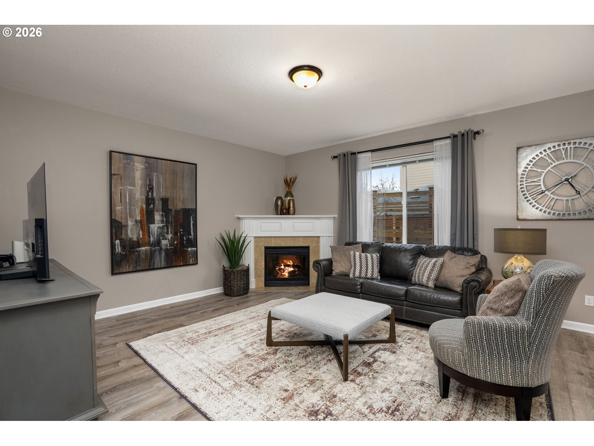 52183 Southeast Tussing Way Scappoose, OR 97056 - Photo 5 of 32 a living room with furniture and a fireplace