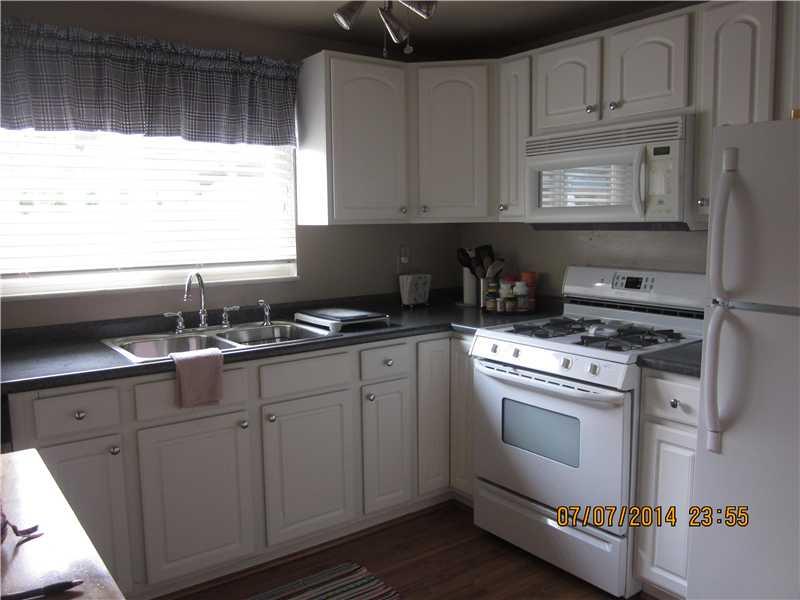 Kitchen. Newer kitchen with laminate floor and all appliances