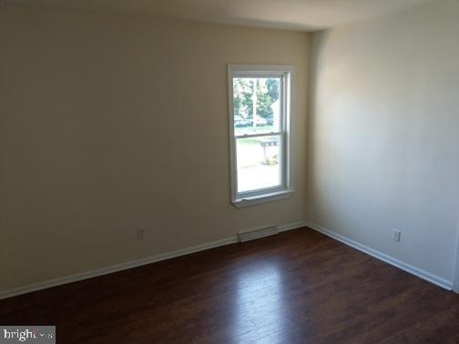 128 South Main Street Glassboro, NJ 08028 - Photo 20 of 21 an empty room with wooden floor and windows