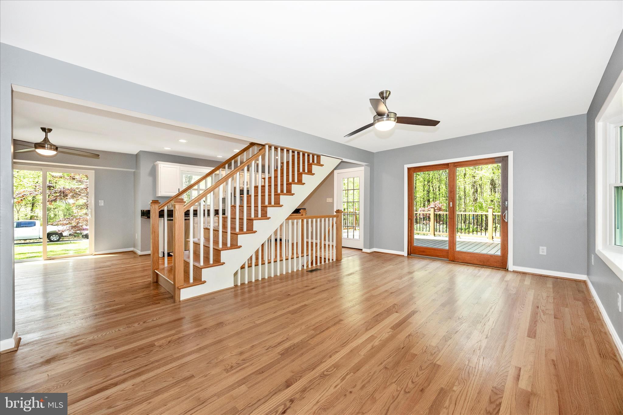 6518 Woodville Road Mount Airy, MD 21771 - Photo 5 of 53 wooden floor in an empty room with a window and wooden floor
