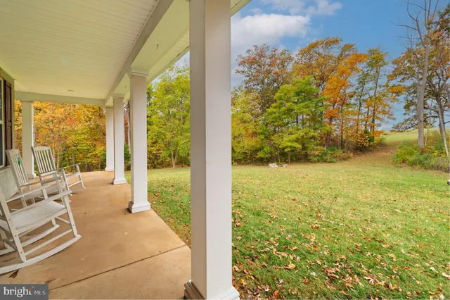 a workspace with furniture and a window
