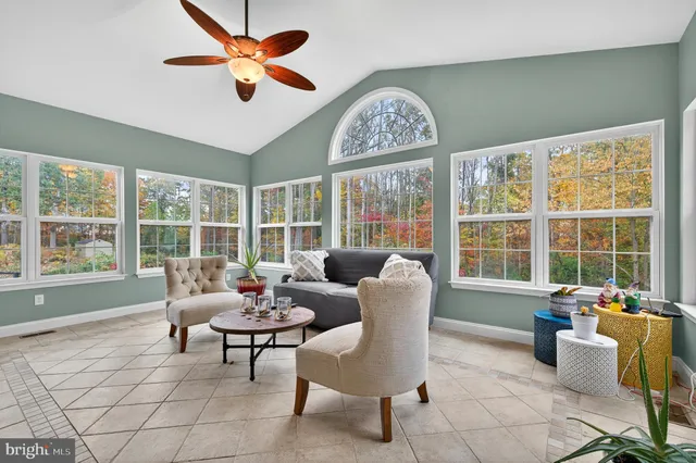 a room with furniture and a chair