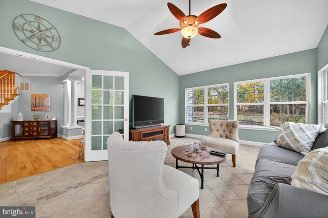 a view of a swimming pool with outdoor seating