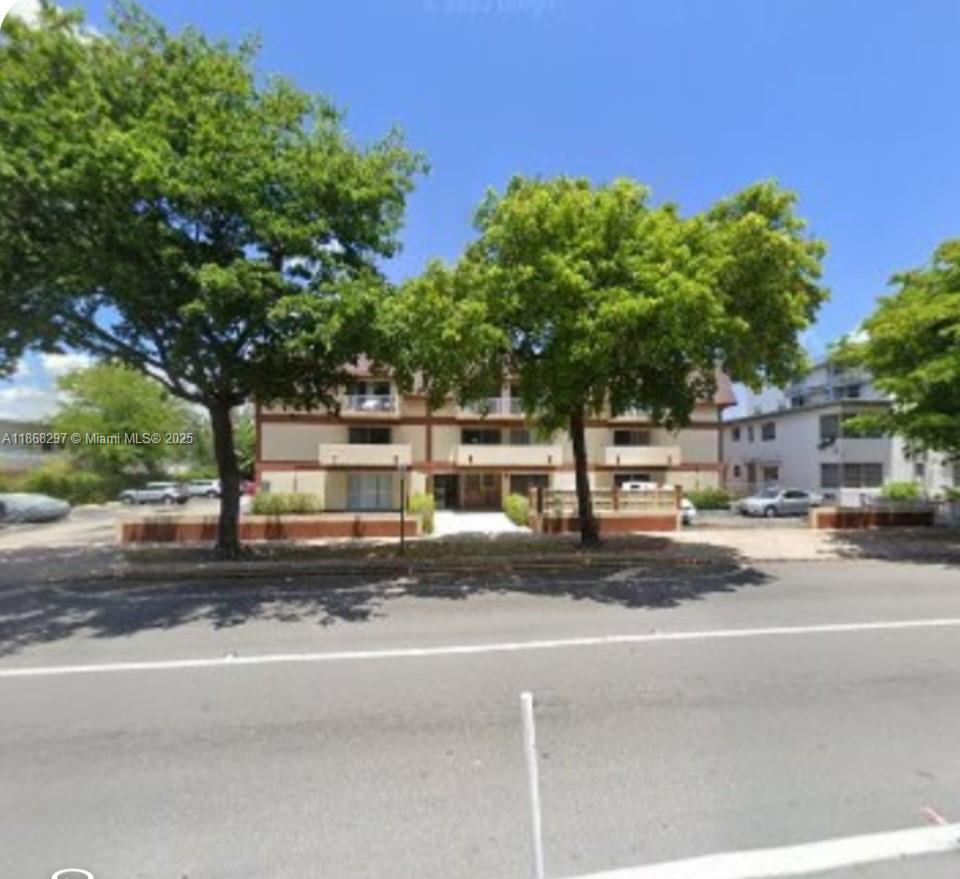 a view of street with tree s