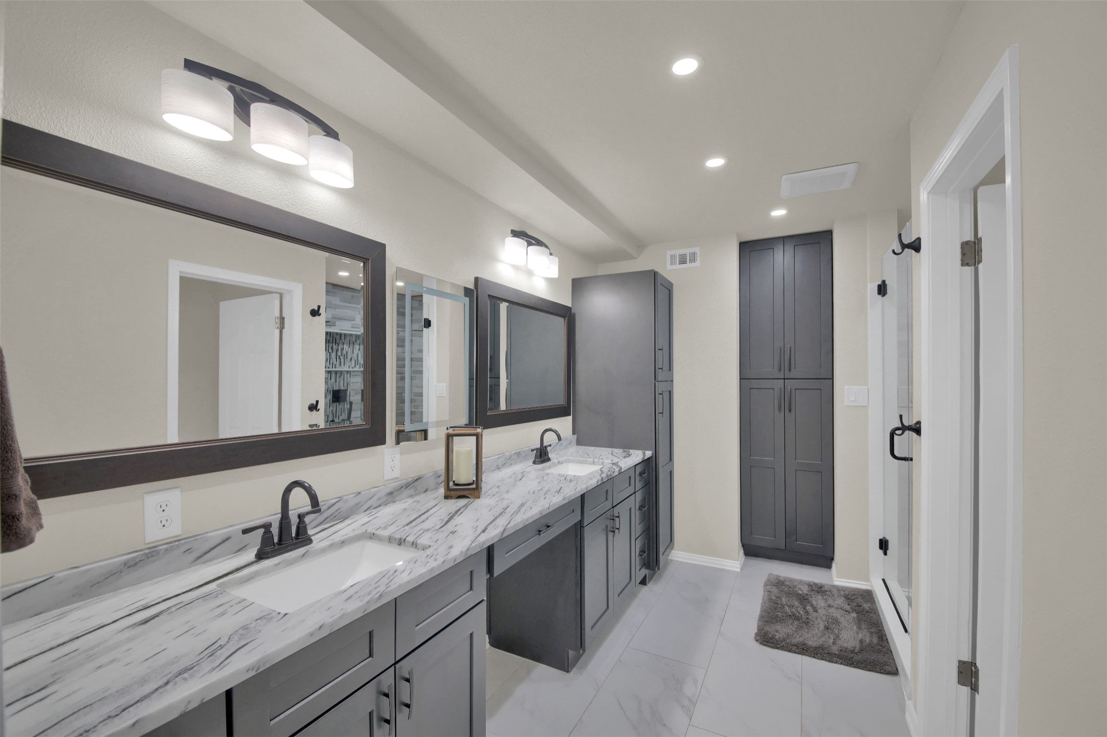 550 C.Bud Stockton Loop Jarrell, TX 76537 - Photo 26 of 37 Full bathroom featuring double vanity, recessed lighting, a stall shower, and light marble finish flooring