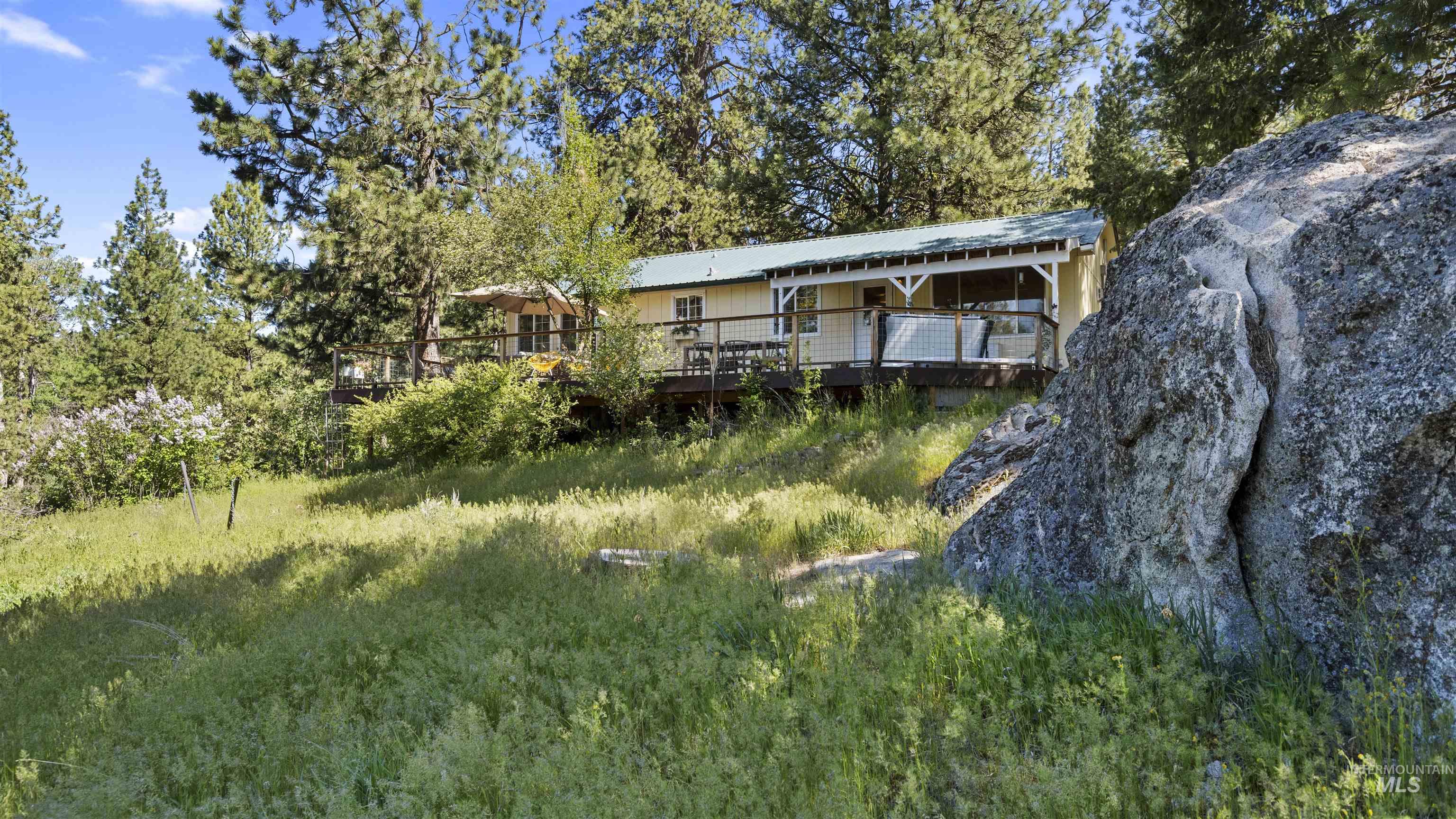 3 Laguna Place Cascade, ID 83611 - Photo 29 of 43 Ranch-style dwelling featuring a light-toned exterior and a green metal roof