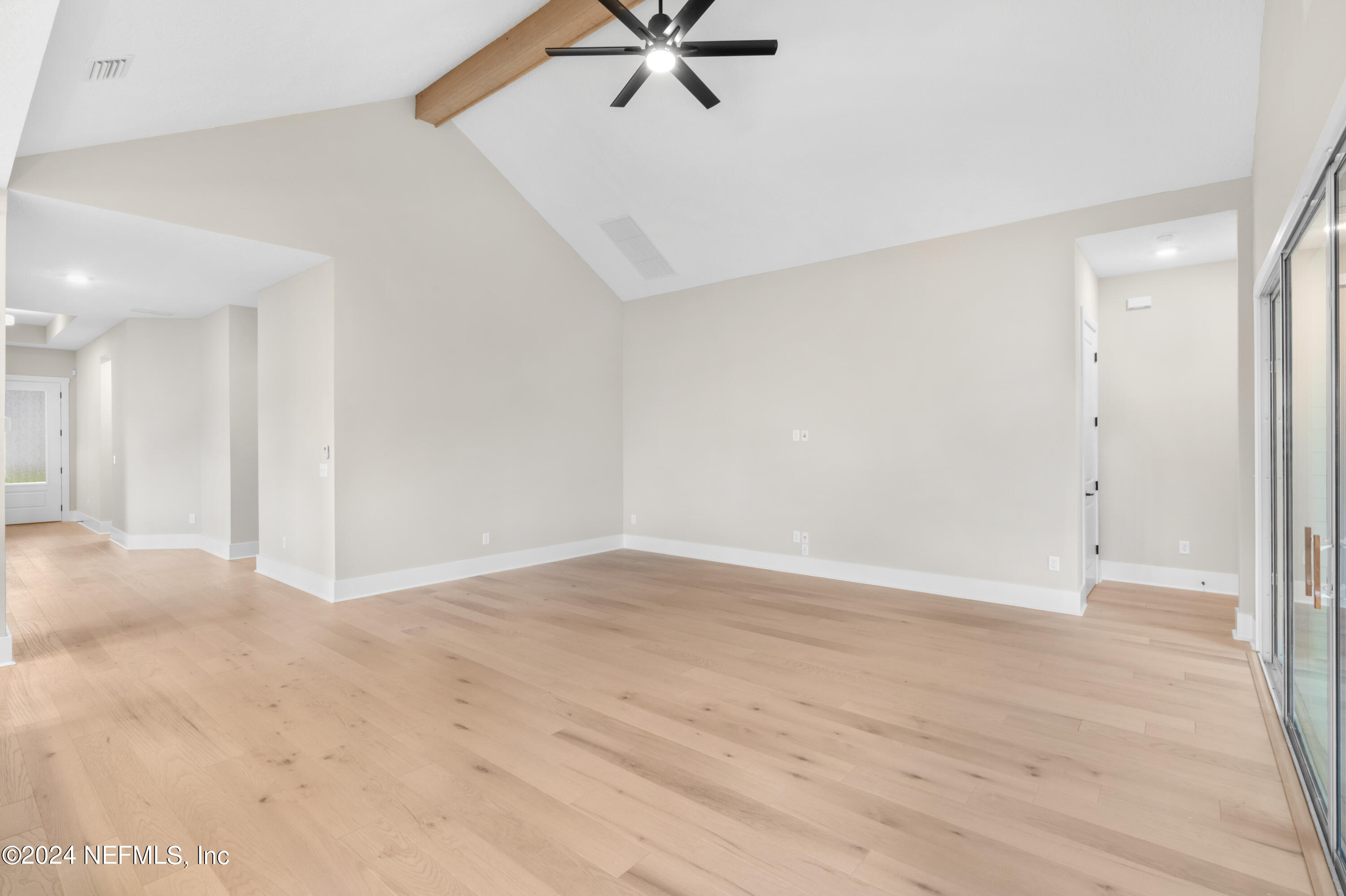 393 Canopy Forest Dr Street St. Augustine, FL 32092 - Photo 12 of 18 wooden floor in an empty room
