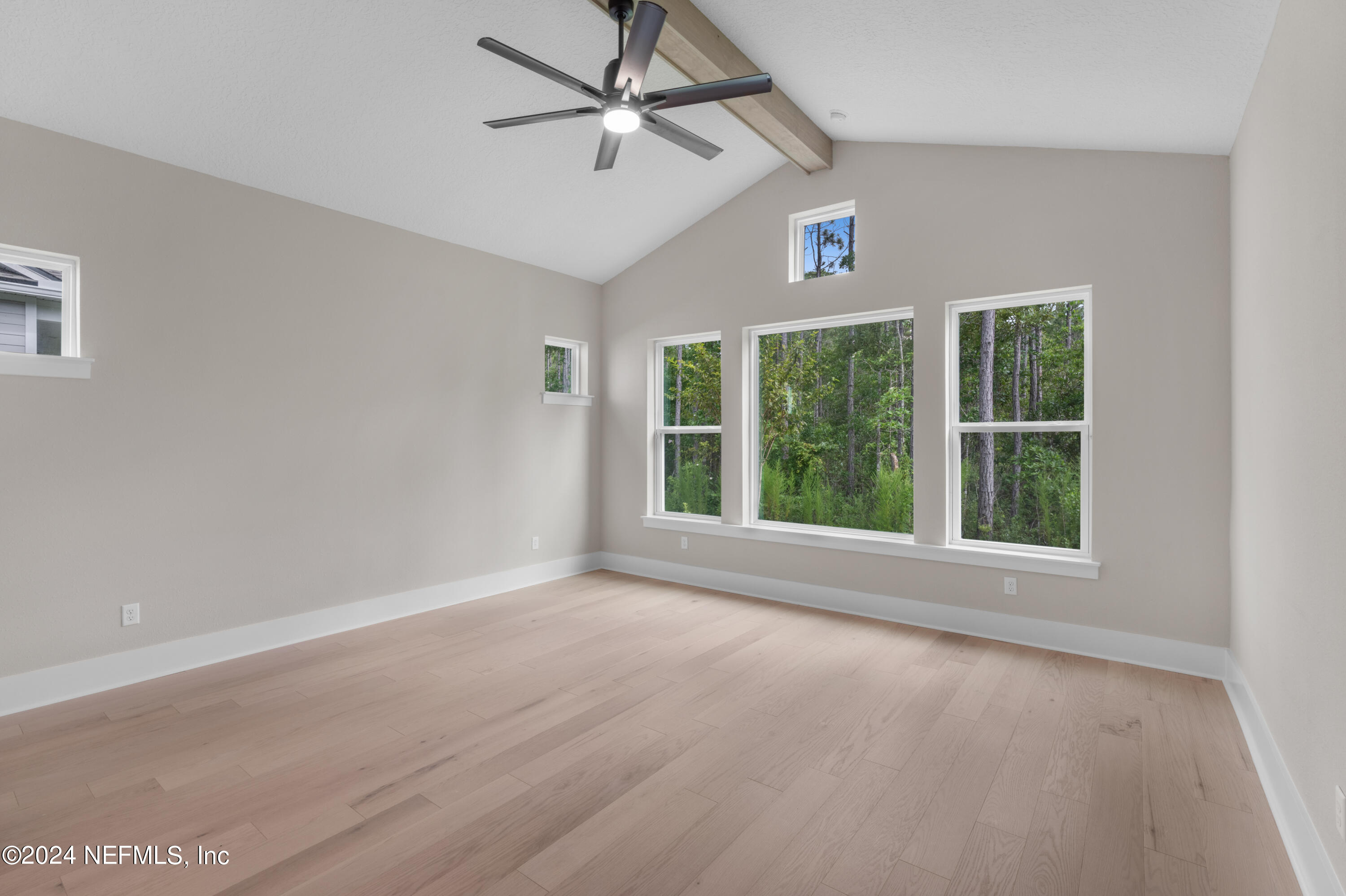 393 Canopy Forest Dr Street St. Augustine, FL 32092 - Photo 14 of 18 a view of an empty room with a window