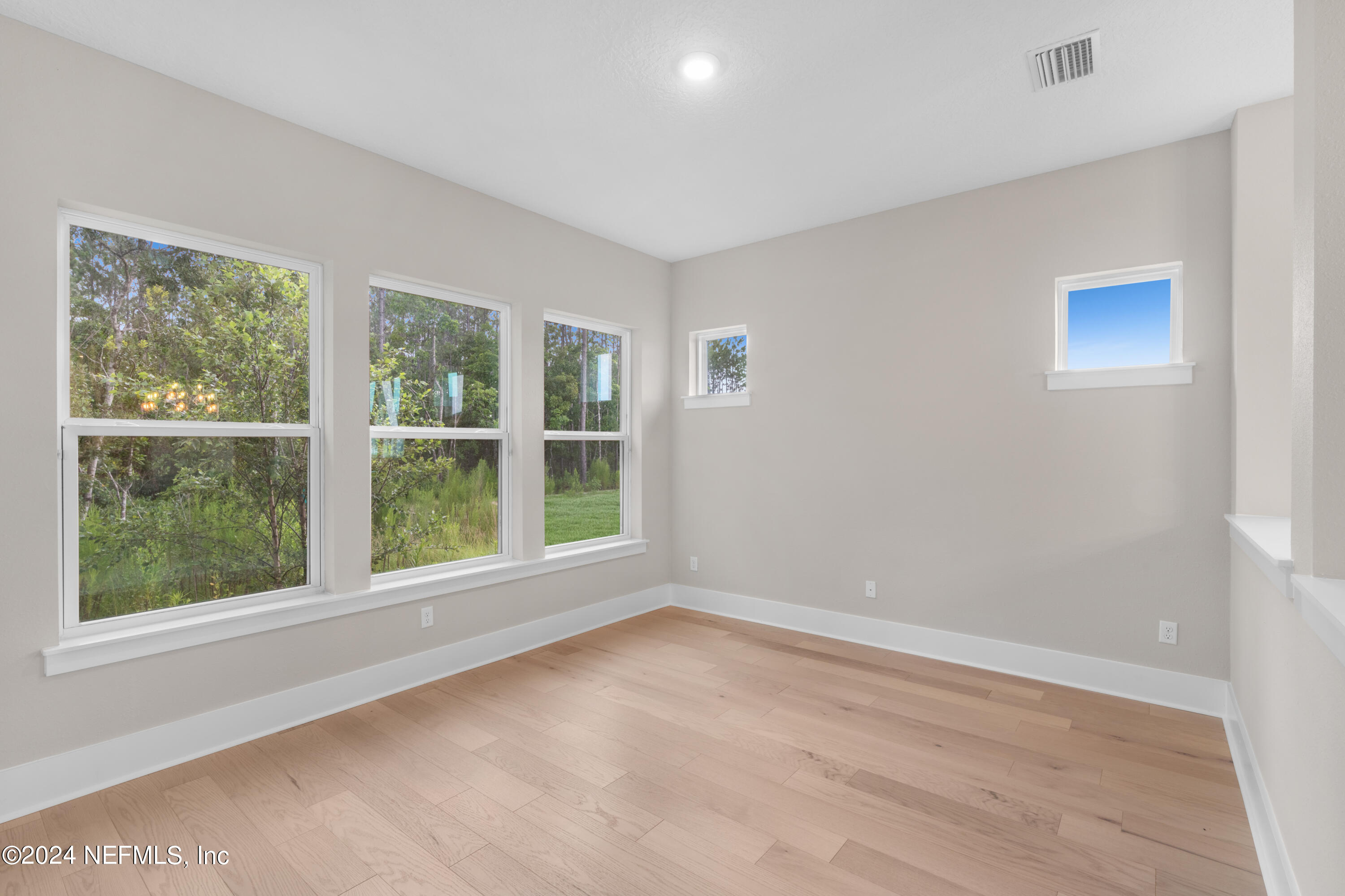 393 Canopy Forest Dr Street St. Augustine, FL 32092 - Photo 18 of 18 an empty room with a window