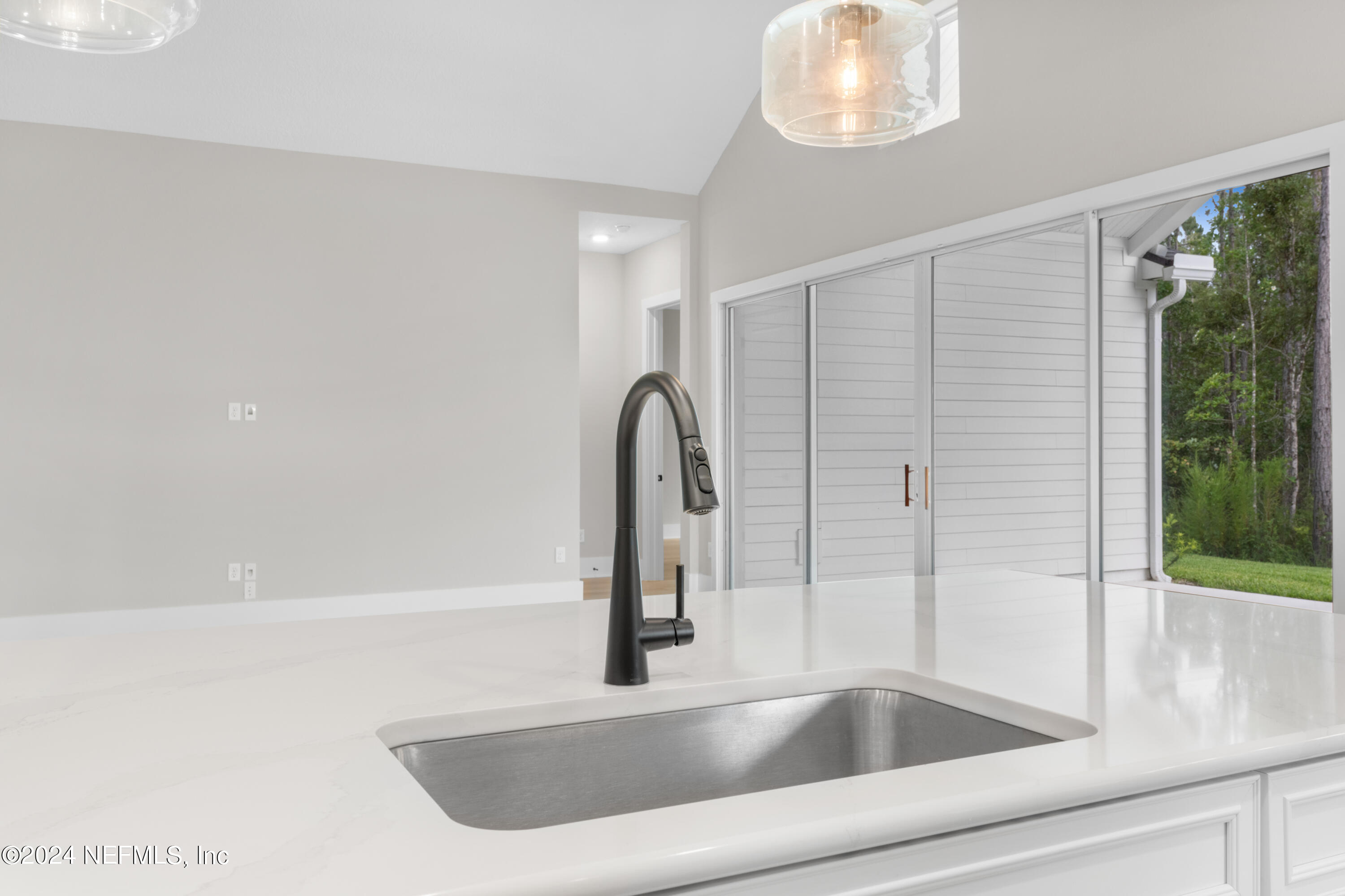 393 Canopy Forest Dr Street St. Augustine, FL 32092 - Photo 6 of 18 a close view of sink and tap