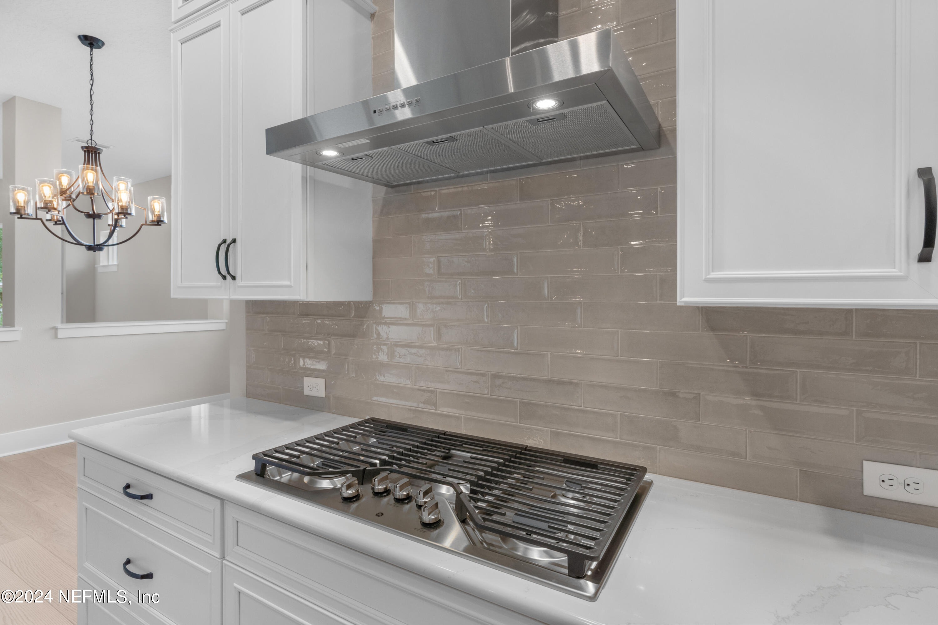 393 Canopy Forest Dr Street St. Augustine, FL 32092 - Photo 7 of 18 a white stove top oven sitting inside of a kitchen