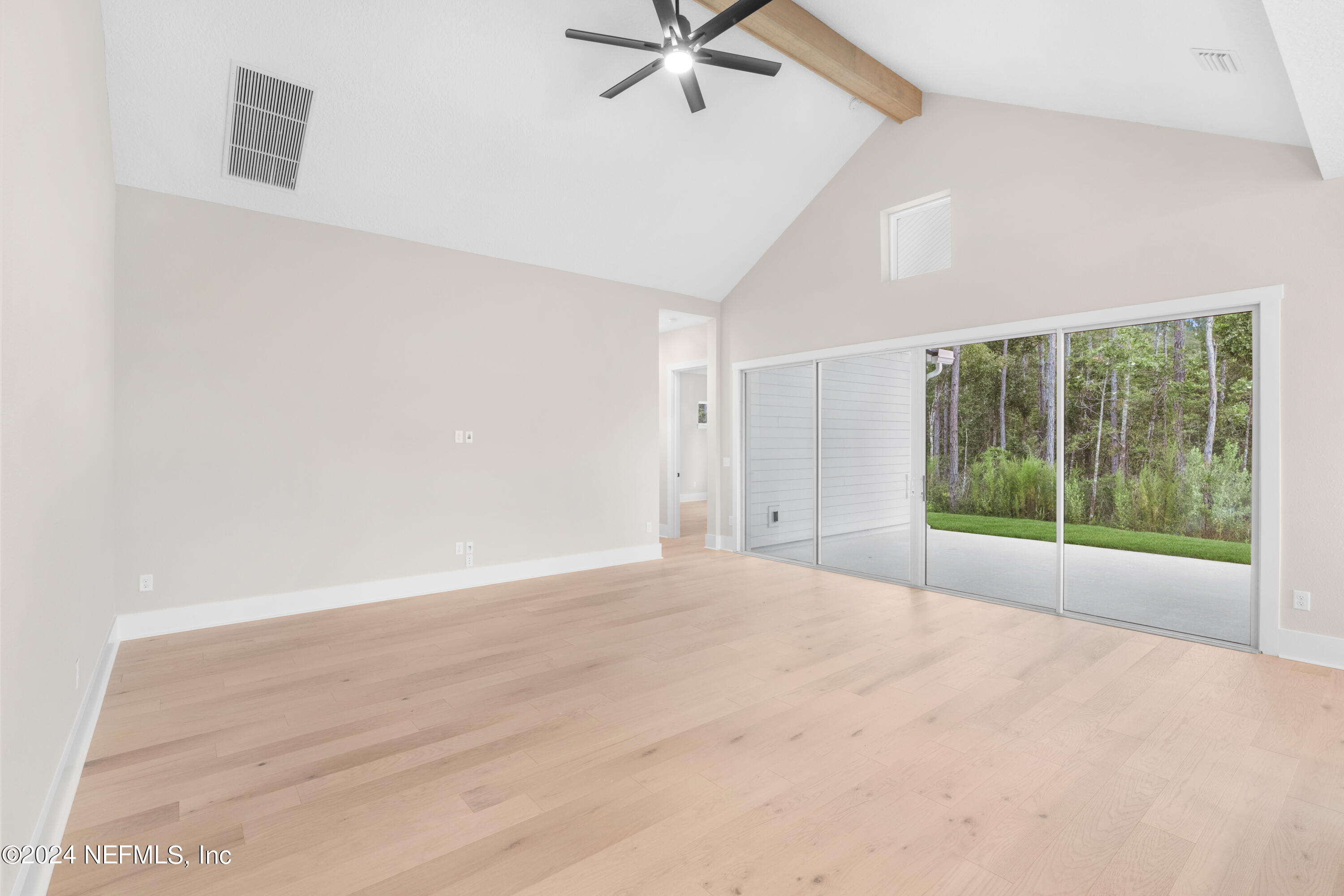 393 Canopy Forest Dr Street St. Augustine, FL 32092 - Photo 10 of 18 a view of an empty room with a window