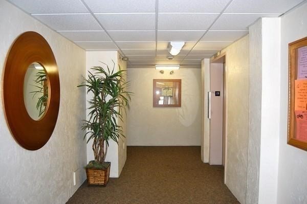 46 Cochituate Road, Unit 408 Framingham, MA 01701 - Photo 3 of 20 a view of a entryway with interior of a house