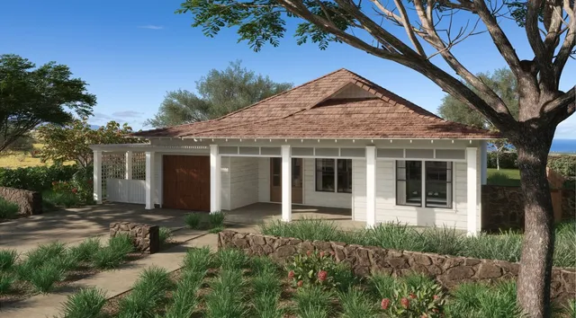 front view of a house with a yard