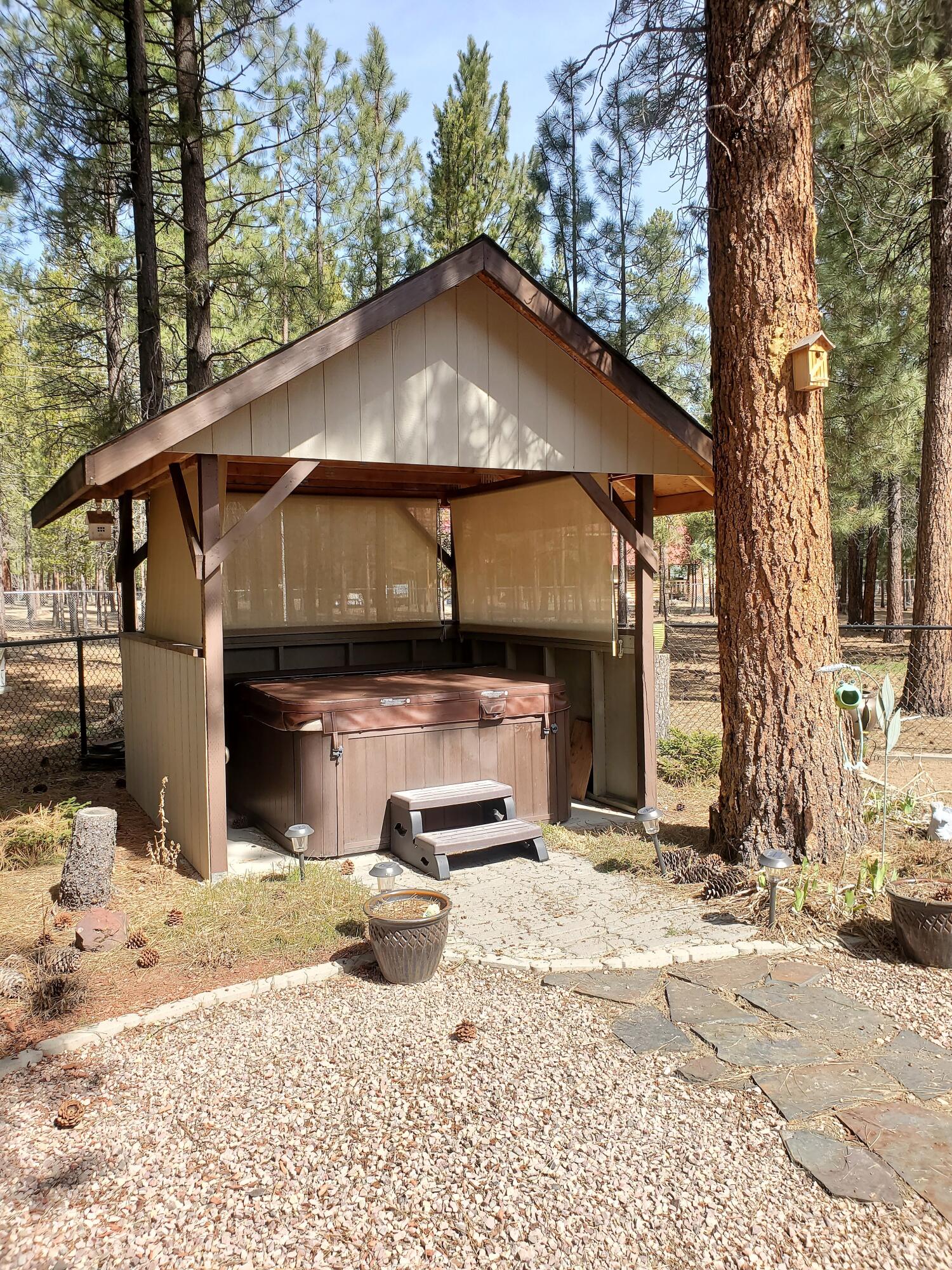 14840 Laurel Road La Pine, OR 97739 - Photo 28 of 32 a view of a house with backyard and sitting area