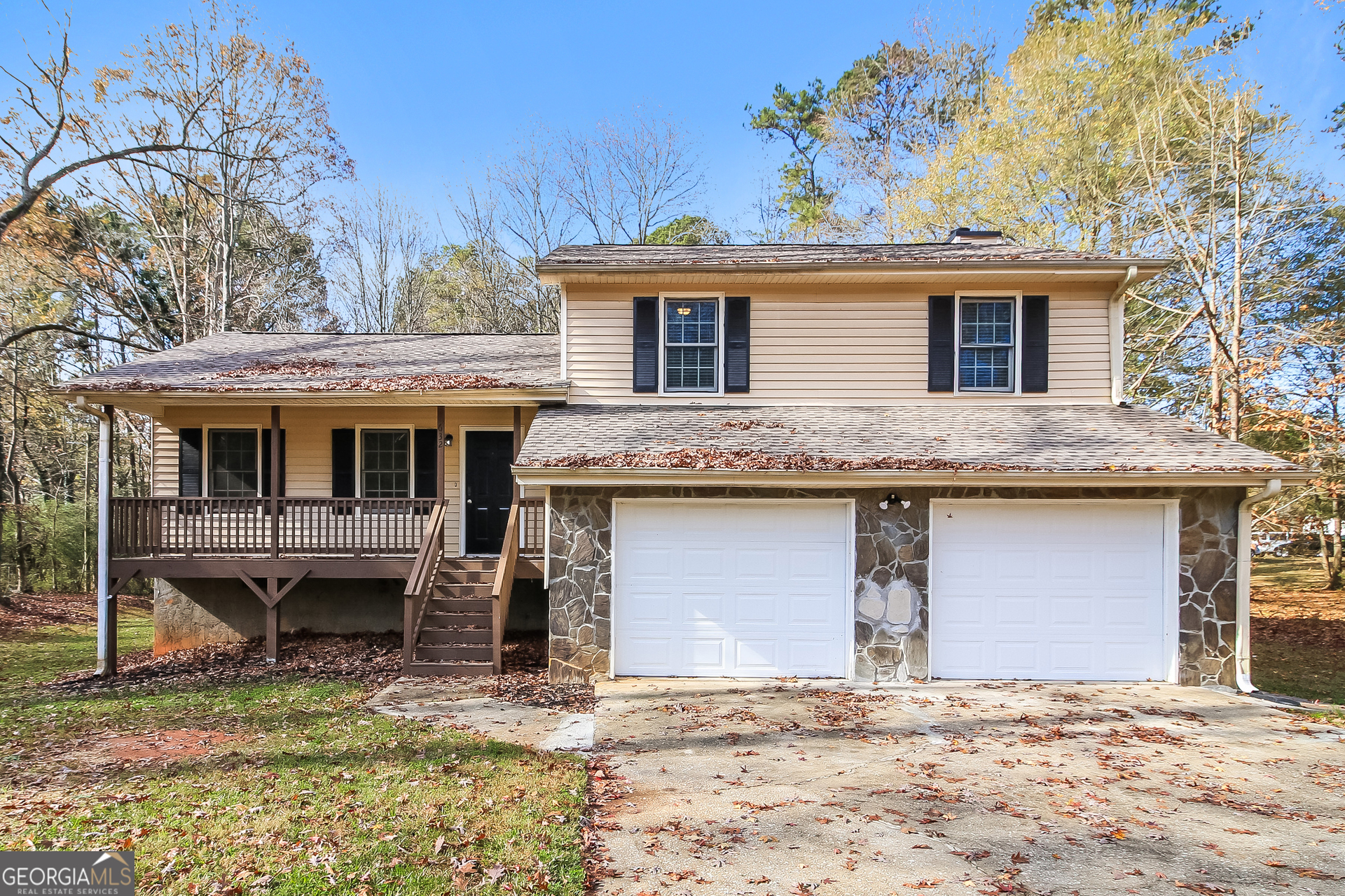 632 Cloudland Drive Stockbridge, GA 30281 - Photo 1 of 18 a view of a white house with large windows